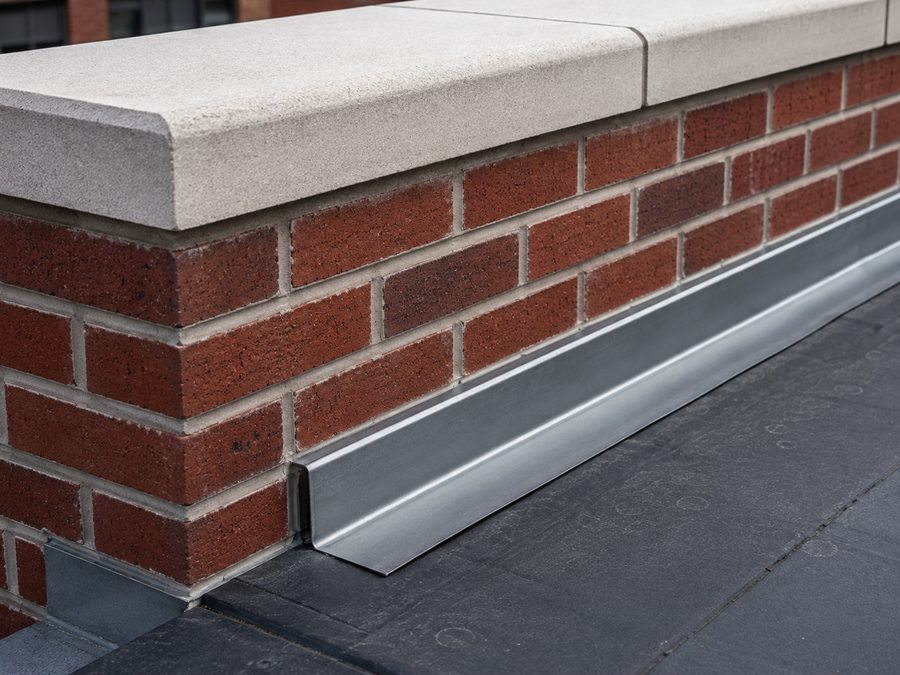 Sound parapet coping and through-wall flashing detail